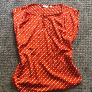 New York & Co. capped sleeve, med, diff shades of orange with white…geo pattern